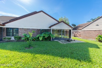 Enjoy stunning water views of the golf course from the back on The Club At Pelican Bay - North Course in Florida - for sale on GolfHomes.com, golf home, golf lot