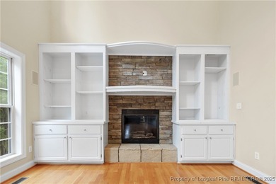 Nestled in a peaceful setting in Gates Four, this beautiful home on Gates Four Golf and Country Club in North Carolina - for sale on GolfHomes.com, golf home, golf lot