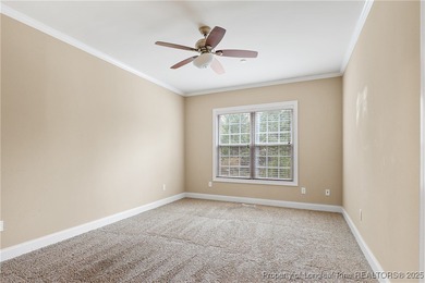 Nestled in a peaceful setting in Gates Four, this beautiful home on Gates Four Golf and Country Club in North Carolina - for sale on GolfHomes.com, golf home, golf lot