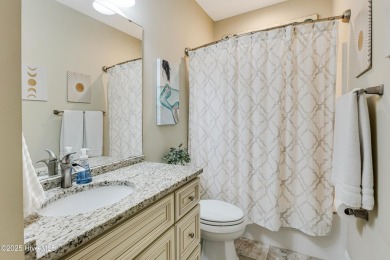 Cottage Cute, this Oak Island 3 bedroom 2 bath home is where on Founders Club At St. James Plantation in North Carolina - for sale on GolfHomes.com, golf home, golf lot