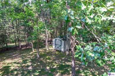 This home sits in the perfect place at the end of a culdsac on Doe Valley Country Club in Kentucky - for sale on GolfHomes.com, golf home, golf lot