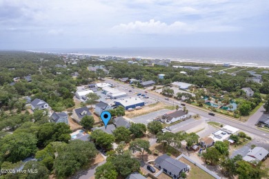Cottage Cute, this Oak Island 3 bedroom 2 bath home is where on Founders Club At St. James Plantation in North Carolina - for sale on GolfHomes.com, golf home, golf lot