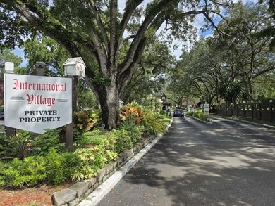 Nestled in a highly desirable International Village community on Inverrary Country Club in Florida - for sale on GolfHomes.com, golf home, golf lot