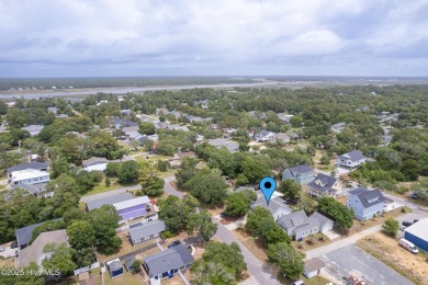 Cottage Cute, this Oak Island 3 bedroom 2 bath home is where on Founders Club At St. James Plantation in North Carolina - for sale on GolfHomes.com, golf home, golf lot