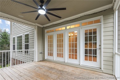 Nestled in a peaceful setting in Gates Four, this beautiful home on Gates Four Golf and Country Club in North Carolina - for sale on GolfHomes.com, golf home, golf lot