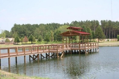 Golf course setting! This beautiful turnkey, low maintenance on Heritage Golf Club in North Carolina - for sale on GolfHomes.com, golf home, golf lot