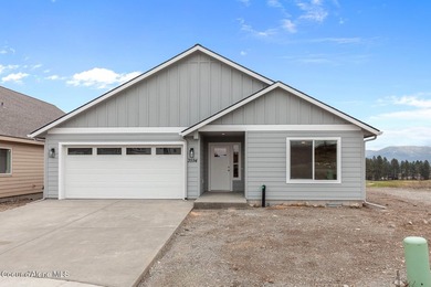 This brand new single-level home is located in a neighborhood on Prairie Falls Golf Club in Idaho - for sale on GolfHomes.com, golf home, golf lot