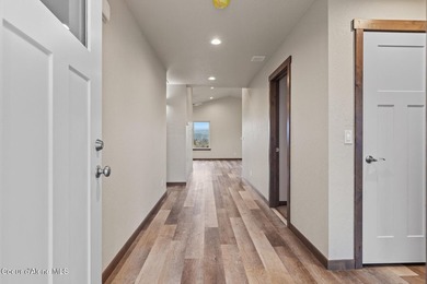 This brand new single-level home is located in a neighborhood on Prairie Falls Golf Club in Idaho - for sale on GolfHomes.com, golf home, golf lot