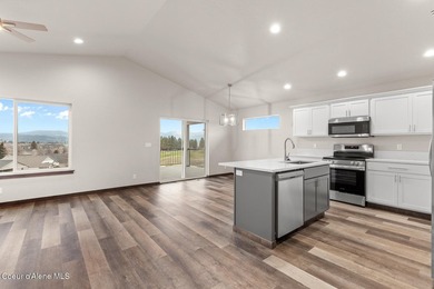 This brand new single-level home is located in a neighborhood on Prairie Falls Golf Club in Idaho - for sale on GolfHomes.com, golf home, golf lot