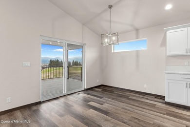 This brand new single-level home is located in a neighborhood on Prairie Falls Golf Club in Idaho - for sale on GolfHomes.com, golf home, golf lot