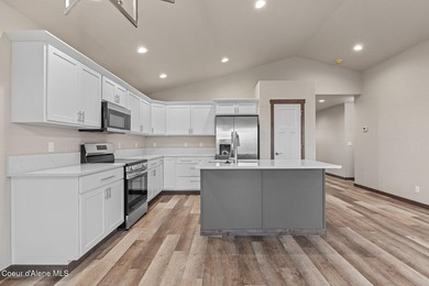 This brand new single-level home is located in a neighborhood on Prairie Falls Golf Club in Idaho - for sale on GolfHomes.com, golf home, golf lot