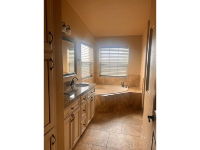 Welcome to 338 Flora Dr, nestled in the sought-after Golf Course on Spring Creek Golf Course in Nevada - for sale on GolfHomes.com, golf home, golf lot
