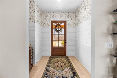 Custom home with high-end finishes and thoughtful design on Bella Vista Country Club - Highlands in Arkansas - for sale on GolfHomes.com, golf home, golf lot