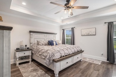 Stunning and beautifully appointed, this 3,431 heated square on Wild Wing Plantation in South Carolina - for sale on GolfHomes.com, golf home, golf lot
