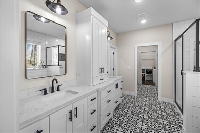 Custom home with high-end finishes and thoughtful design on Bella Vista Country Club - Highlands in Arkansas - for sale on GolfHomes.com, golf home, golf lot