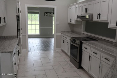 $10.000.00 TOWARD BUYERS CLOSING COST WITH A ACCEPTABLE OFFER on Mississippi National Golf Course in Mississippi - for sale on GolfHomes.com, golf home, golf lot