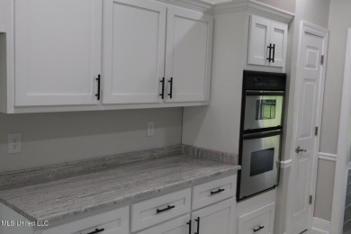 $10.000.00 TOWARD BUYERS CLOSING COST WITH A ACCEPTABLE OFFER on Mississippi National Golf Course in Mississippi - for sale on GolfHomes.com, golf home, golf lot
