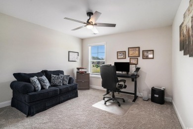 Stunning and beautifully appointed, this 3,431 heated square on Wild Wing Plantation in South Carolina - for sale on GolfHomes.com, golf home, golf lot