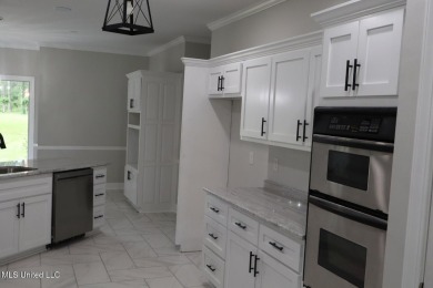 $10.000.00 TOWARD BUYERS CLOSING COST WITH A ACCEPTABLE OFFER on Mississippi National Golf Course in Mississippi - for sale on GolfHomes.com, golf home, golf lot