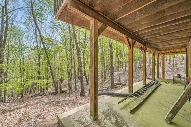 Welcome home to this beautiful contemporary with SEASONAL LAKE on The Highlands Course at Lake Arrowhead in Georgia - for sale on GolfHomes.com, golf home, golf lot