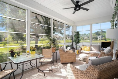 Stunning and beautifully appointed, this 3,431 heated square on Wild Wing Plantation in South Carolina - for sale on GolfHomes.com, golf home, golf lot