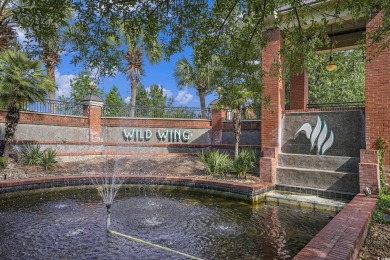 Stunning and beautifully appointed, this 3,431 heated square on Wild Wing Plantation in South Carolina - for sale on GolfHomes.com, golf home, golf lot