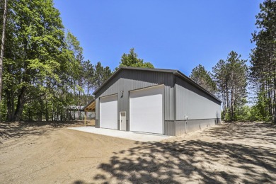 Built in 2022, 40 X 80 X 16 pole barn with a 12 X 80 lean-to, 14 on Grand View Golf Club in Michigan - for sale on GolfHomes.com, golf home, golf lot