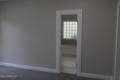 $10.000.00 TOWARD BUYERS CLOSING COST WITH A ACCEPTABLE OFFER on Mississippi National Golf Course in Mississippi - for sale on GolfHomes.com, golf home, golf lot