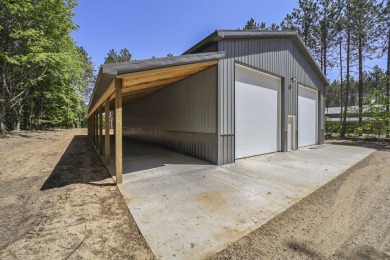 Built in 2022, 40 X 80 X 16 pole barn with a 12 X 80 lean-to, 14 on Grand View Golf Club in Michigan - for sale on GolfHomes.com, golf home, golf lot