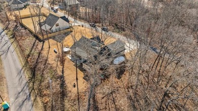 Custom home with high-end finishes and thoughtful design on Bella Vista Country Club - Highlands in Arkansas - for sale on GolfHomes.com, golf home, golf lot