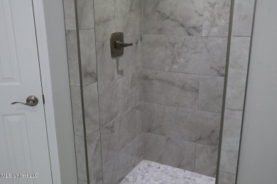 $10.000.00 TOWARD BUYERS CLOSING COST WITH A ACCEPTABLE OFFER on Mississippi National Golf Course in Mississippi - for sale on GolfHomes.com, golf home, golf lot
