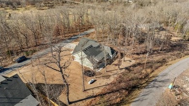 Custom home with high-end finishes and thoughtful design on Bella Vista Country Club - Highlands in Arkansas - for sale on GolfHomes.com, golf home, golf lot