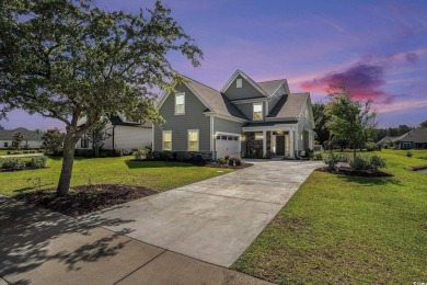 Stunning and beautifully appointed, this 3,431 heated square on Wild Wing Plantation in South Carolina - for sale on GolfHomes.com, golf home, golf lot