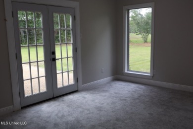 $10.000.00 TOWARD BUYERS CLOSING COST WITH A ACCEPTABLE OFFER on Mississippi National Golf Course in Mississippi - for sale on GolfHomes.com, golf home, golf lot