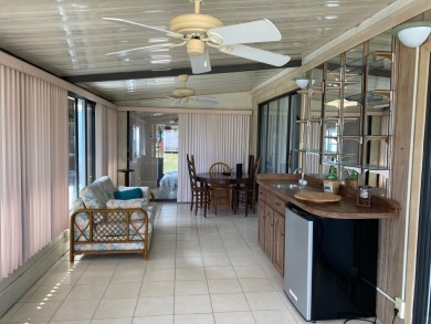 LIVE FREE FOR 1 YEAR, LOT RENT PAID SAVE $7260.00 GREAT DEAL !!! on Lake Henry Golf Club in Florida - for sale on GolfHomes.com, golf home, golf lot