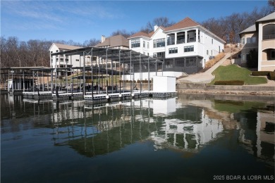 Welcome to a masterpiece of luxury living in the heart of Porto on The Club At Porto Cima in Missouri - for sale on GolfHomes.com, golf home, golf lot