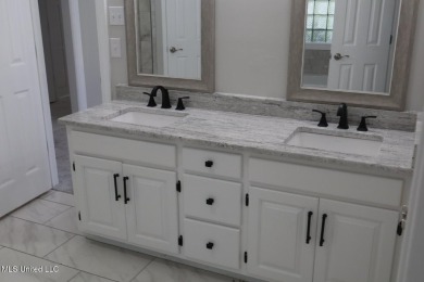 $10.000.00 TOWARD BUYERS CLOSING COST WITH A ACCEPTABLE OFFER on Mississippi National Golf Course in Mississippi - for sale on GolfHomes.com, golf home, golf lot
