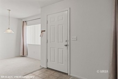 DON'T DO THOSE STEPS. Discover comfortable living in this on The Oasis Golf Club in Nevada - for sale on GolfHomes.com, golf home, golf lot