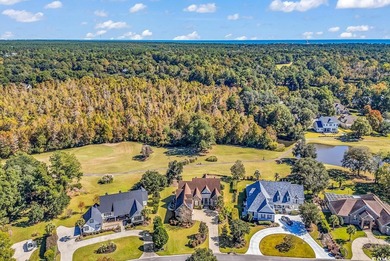 Coastal elegance meets Lowcountry charm in this exceptional on Willbrook Plantation Golf Club in South Carolina - for sale on GolfHomes.com, golf home, golf lot