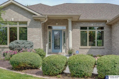 Indulge in luxury at this elegant ranch-style home in the on Wilderness Ridge Golf Club in Nebraska - for sale on GolfHomes.com, golf home, golf lot