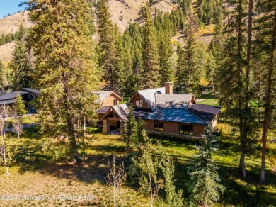 Welcome to a stunning residence nestled within the prestigious on Snake River Sporting Club in Wyoming - for sale on GolfHomes.com, golf home, golf lot