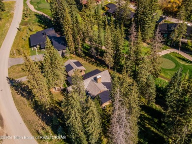 Welcome to a stunning residence nestled within the prestigious on Snake River Sporting Club in Wyoming - for sale on GolfHomes.com, golf home, golf lot