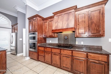 Located in a prestigious gated golf course community, this on Shell Landing Golf Club in Mississippi - for sale on GolfHomes.com, golf home, golf lot