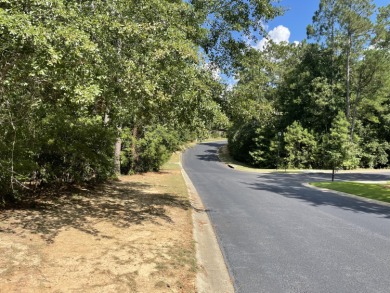 Lovely, well-treed home site with a front to back topography in on The Golf Club At Cedar Creek in South Carolina - for sale on GolfHomes.com, golf home, golf lot