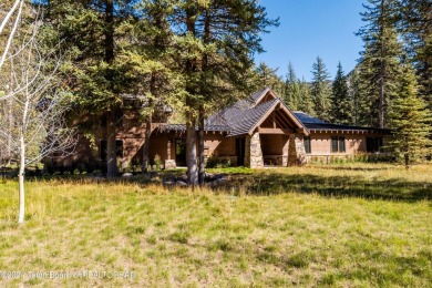 Welcome to a stunning residence nestled within the prestigious on Snake River Sporting Club in Wyoming - for sale on GolfHomes.com, golf home, golf lot