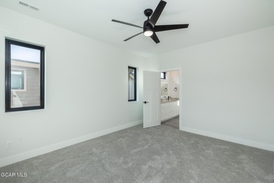 Stunning brand-new 5-bedroom home located along the Grand Elk on Grand Elk Ranch and Club in Colorado - for sale on GolfHomes.com, golf home, golf lot