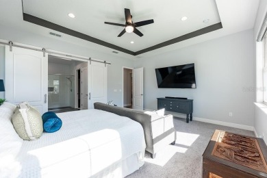 Under contract-accepting backup offers. Built in 2021 and better on Eagle Creek Golf Club in Florida - for sale on GolfHomes.com, golf home, golf lot
