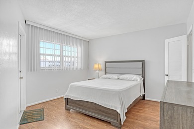 Enjoy waterfront living with wide water views from this freshly on North Palm Beach Country Club in Florida - for sale on GolfHomes.com, golf home, golf lot