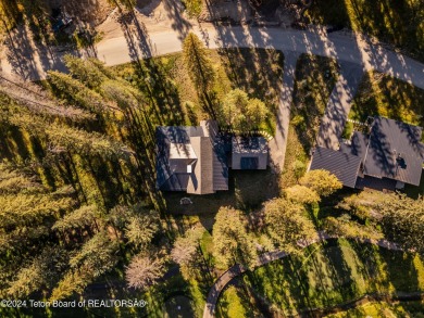 Welcome to a stunning residence nestled within the prestigious on Snake River Sporting Club in Wyoming - for sale on GolfHomes.com, golf home, golf lot