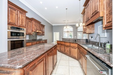 Located in a prestigious gated golf course community, this on Shell Landing Golf Club in Mississippi - for sale on GolfHomes.com, golf home, golf lot